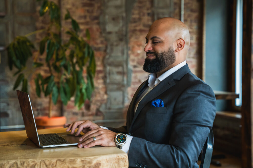 Rashad Frelin meeting with a local business owner at a coffee shop